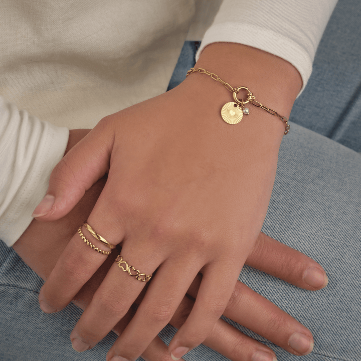 Armband mit Münze und Perle