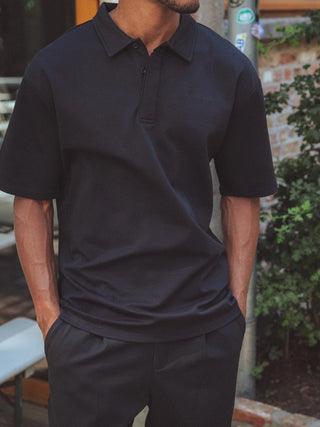 Schwarzes Sechzehn Oversized Polo
